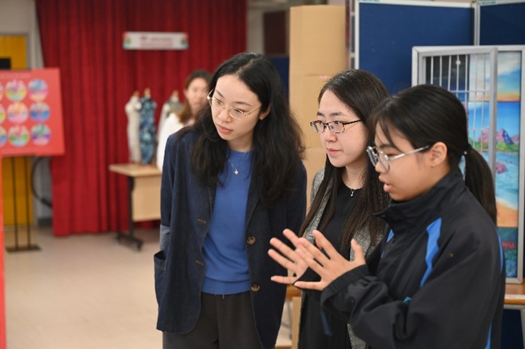 Teachers from our sister school listening to a sharing from a Shungtakian 